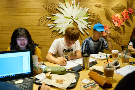 SEOUL, SOUTH KOREA - CIRCA MAY, 2017: people at Starbucks in Seoul. Starbucks Corporation is an...