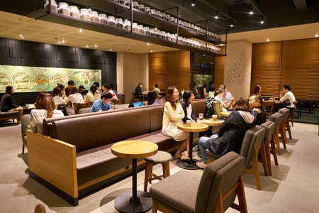 SEOUL, SOUTH KOREA - CIRCA MAY, 2017: inside Starbucks in Seoul. Starbucks Corporation is an American coffee company and coffeehouse chain.のeditorial素材