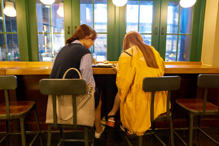 SEOUL, SOUTH KOREA - CIRCA MAY, 2017: people at Starbucks in Seoul. Starbucks Corporation is an American coffee company and coffeehouse chain.のeditorial素材