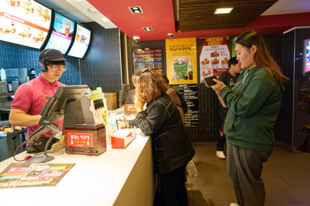 SEOUL, SOUTH KOREA - CIRCA MAY, 2017: counter service in a McDonald's restaurant. McDonald's is an American hamburger and fast food restaurant chain.のeditorial素材
