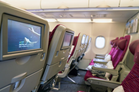 MOSCOW, RUSSIA - CIRCA MAY, 2017: a seat-back screen inside the cabin of Qatar Airways Airbus A321....
