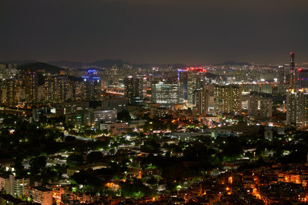 SEOUL, SOUTH KOREA - CIRCA JUNE, 2017: Seoul city view from Namsan Mountain at nighttime. Seoul Special City is the capital and largest metropolis of the Republic of Korea.のeditorial素材