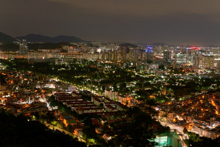 SEOUL, SOUTH KOREA - CIRCA JUNE, 2017: Seoul city view from Namsan Mountain at nighttime. Seoul Special City is the capital and largest metropolis of the Republic of Korea.のeditorial素材
