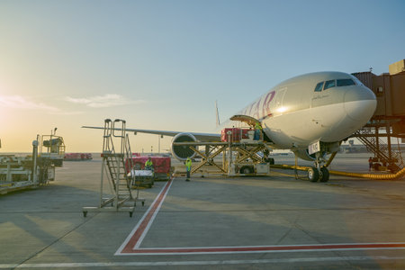 DOHA, QATAR - CIRCA JUNE, 2017: Qatar Airways aircraft on tarmac at Hamad International Airport in the morning.のeditorial素材