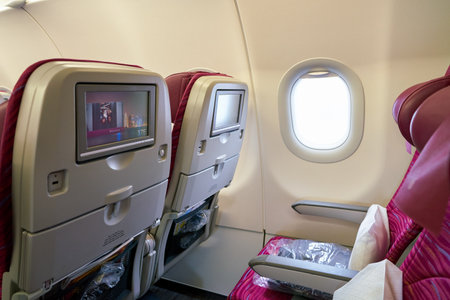 MOSCOW, RUSSIA - CIRCA MAY, 2017: inside Qatar Airways Airbus A321. Qatar Airways, is the state-owned flag carrier of Qatar.のeditorial素材