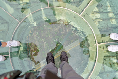 SEOUL, SOUTH KOREA -  MAY 20, 2017: view from Seoul 7017 Skypark through porthole-style glass floor sections. The Seoullo 7017 Skypark, is an elevated linear park in central Seoul  which opened on May 20, 2017.のeditorial素材
