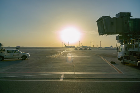 DOHA, QATAR - CIRCA JUNE, 2017: a boarding bridge at Hamad International Airport in the morning.のeditorial素材