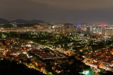 SEOUL, SOUTH KOREA - CIRCA JUNE, 2017: Seoul city view from Namsan Mountain at nighttime. Seoul Special City is the capital and largest metropolis of the Republic of Korea.のeditorial素材