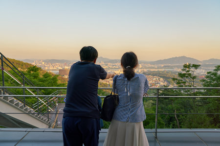 SEOUL, SOUTH KOREA - CIRCA MAY, 2017: people watch Seoul city view from Namsan Mountain in central Seoul. Seoul Special City is the capital and largest metropolis of the Republic of Korea.のeditorial素材