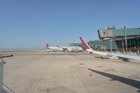 DOHA, QATAR - CIRCA JUNE, 2017: Qatar Airways aircraft at Hamad International Airport.のeditorial素材