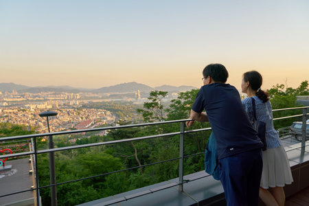 SEOUL, SOUTH KOREA - CIRCA MAY, 2017: people watch Seoul city view from Namsan Mountain in central Seoul. Seoul Special City is the capital and largest metropolis of the Republic of Korea.のeditorial素材