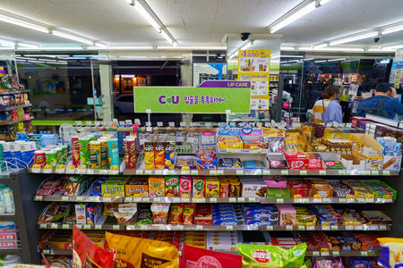 SEOUL, SOUTH KOREA - CIRCA MAY, 2017: goods on display at a CU convenience store. CU is a convenience store franchise chain in South Korea.のeditorial素材