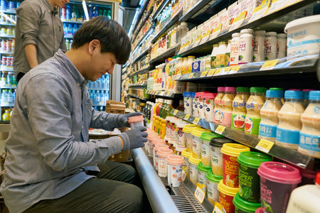 SEOUL, SOUTH KOREA - CIRCA MAY, 2017: worker at a convenience store in Seoul.のeditorial素材