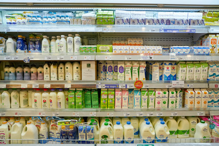 SEOUL, SOUTH KOREA - CIRCA MAY, 2017: milk on display at Lotte Mart in Seoul. Lotte Mart is an east Asian hypermarket that sells a variety of groceries, clothing, toys, electronics, and other goods.のeditorial素材