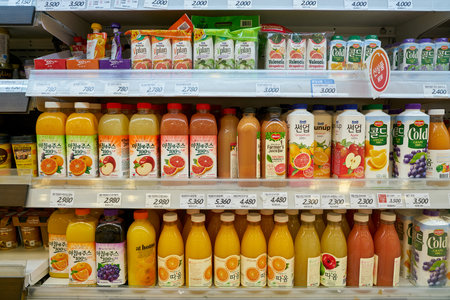 SEOUL, SOUTH KOREA - CIRCA MAY, 2017: juice on display at Lotte Mart in Seoul. Lotte Mart is an east Asian hypermarket that sells a variety of groceries, clothing, toys, electronics, and other goods.のeditorial素材
