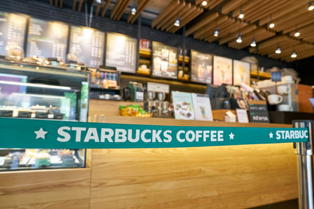 BUSAN, SOUTH KOREA - CIRCA MAY, 2017: close up shot of Starbucks sign at coffee shop in Busan....