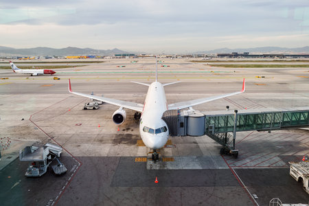 BARCELONA, SPAIN - CIRCA NOVEMBER, 2015: passenger jet airplane docked at Barcelona Airport. Barcelona-El Prat Airport is an international airport. It is the main airport of Catalonia, Spain.のeditorial素材