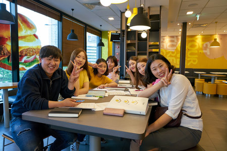 BUSAN, SOUTH KOREA - CIRCA MAY, 2017: people at McDonald's restaurant. McDonald's is an American hamburger and fast food restaurant chain.のeditorial素材