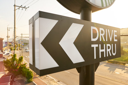 BUSAN, SOUTH KOREA - CIRCA MAY, 2017: drive-thru sign at Starbucks coffee shop in Busan. Starbucks Corporation is an American coffee company and coffeehouse chain.のeditorial素材