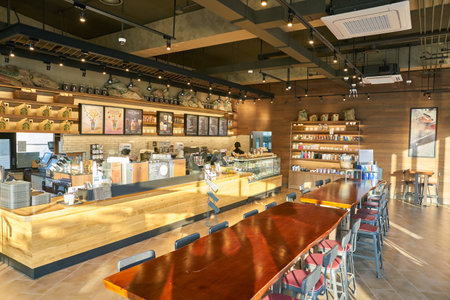 BUSAN, SOUTH KOREA - CIRCA MAY, 2017: inside Starbucks coffee shop in Busan. Starbucks Corporation is an American coffee company and coffeehouse chain.のeditorial素材