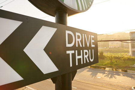 BUSAN, SOUTH KOREA - CIRCA MAY, 2017: drive-thru sign at Starbucks coffee shop in Busan. Starbucks...