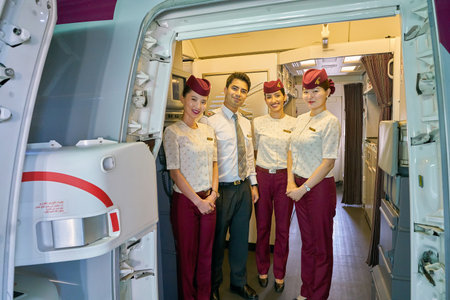 INCHEON, SOUTH KOREA - CIRCA MAY, 2017: Qatar Airways crew members on board of Boeing 777. Qatar Airways is the state-owned flag carrier of Qatar.のeditorial素材
