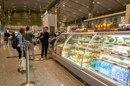 DOHA, QATAR - CIRCA MAY, 2017: cafe at Hamad International Airport of Doha, the capital city of Qatar.のeditorial素材