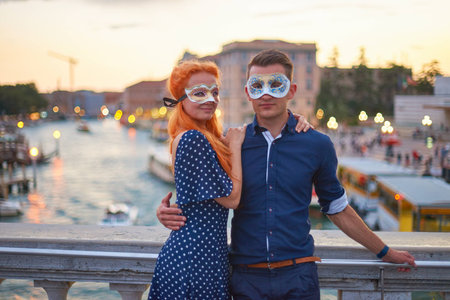 Young couple dating on the bridge in center of Venice.の写真素材
