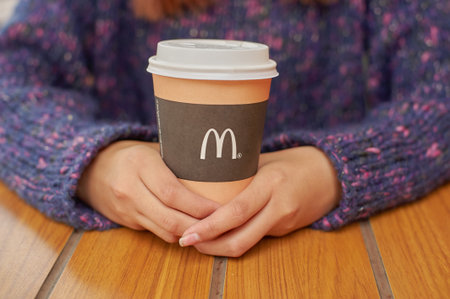 KALININGRAD, RUSSIA - CIRCA SEPTEMBER, 2017: close up shot of McDonald's disposable paper coffee...