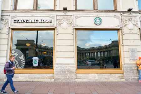 SAINT PETERSBURG, RUSSIA - CIRCA OCTOBER, 2017: a Starbucks coffee shop in Saint Petersburg. Starbucks Corporation is an American coffee company and coffeehouse chain.のeditorial素材
