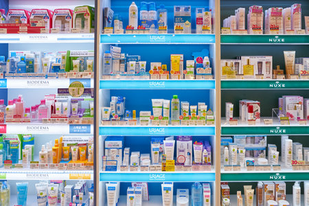 BUSAN, SOUTH KOREA - MAY 28, 2017: cosmetic products sit on display for sale at Olive Young shop at Lotte Department Store in Busan.のeditorial素材