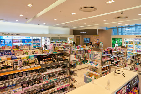 BUSAN, SOUTH KOREA - MAY 28, 2017: cosmetic products sit on display for sale at Olive Young shop at...
