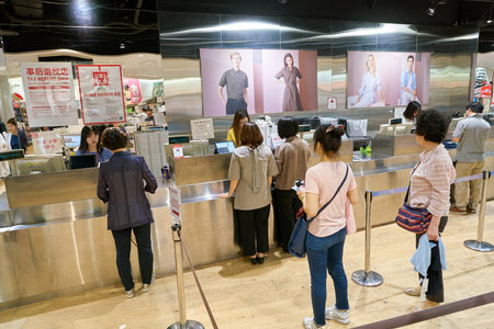 BUSAN, SOUTH KOREA - MAY 28, 2017: inside Uniqlo store at Lotte Department Store in Busan. Uniqlo...
