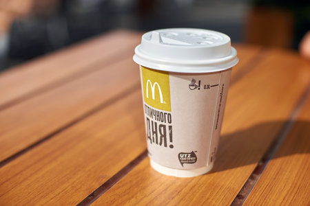 KALININGRAD, RUSSIA - CIRCA AUGUST, 2017: a cup of coffee on a table at McDonald's restaurant in...