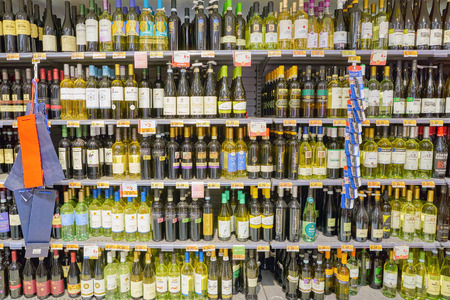ROME, ITALY - CIRCA NOVEMBER 2017: bottles of wine on display in Conad supermarket in Rome.のeditorial素材