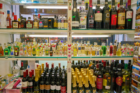 ROME, ITALY - CIRCA NOVEMBER 2017: shelves filled with bottles in a convenience store in Rome.のeditorial素材