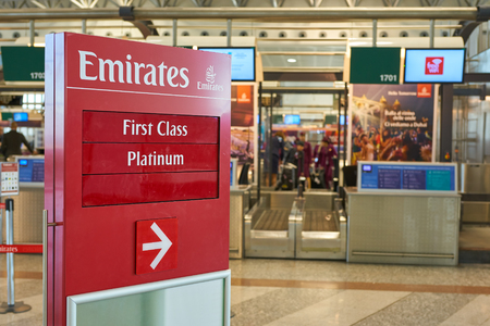 MILAN MALPENSA, ITALY - CIRCA NOVEMBER, 2017: Emirates Airlines check-in area at Milan-Malpensa airport, Terminal 1.のeditorial素材