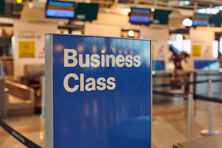 MILAN MALPENSA, ITALY - CIRCA NOVEMBER, 2017: business class sign at check-in area in Milan-Malpensa airport, Terminal 1.のeditorial素材