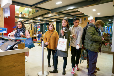 MILAN, ITALY - CIRCA NOVEMBER, 2017: customers at a McDonald's restaurant in Milan.