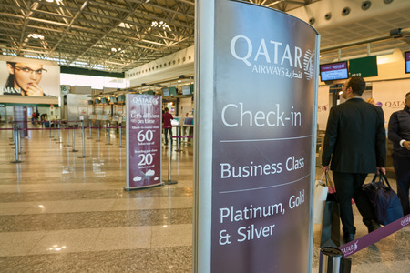 MILAN MALPENSA, ITALY - CIRCA NOVEMBER, 2017: Qatar Airways check-in area at Milan-Malpensa airport, Terminal 1.のeditorial素材