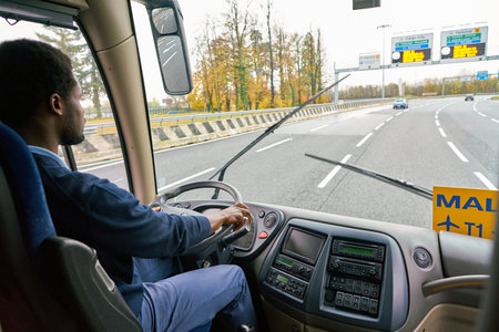 MILAN MALPENSA, ITALY - CIRCA NOVEMBER, 2017: Airport Bus Express driver drive a bus from Malpensa airport to Milan.のeditorial素材