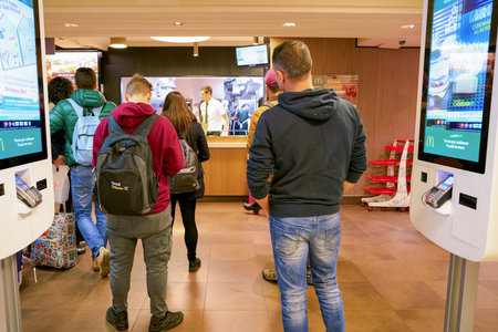 MILAN, ITALY - CIRCA NOVEMBER, 2017: customers at a McDonald's restaurant in Milan.