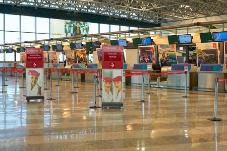 MILAN MALPENSA, ITALY - CIRCA NOVEMBER, 2017: Emirates Airlines check-in area at Milan-Malpensa airport, Terminal 1.のeditorial素材