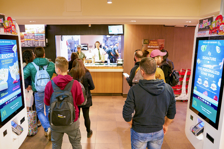 MILAN, ITALY - CIRCA NOVEMBER, 2017: customers at a McDonald's restaurant in Milan.