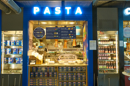 MILAN MALPENSA, ITALY - CIRCA NOVEMBER, 2017: a food court at Milan-Malpensa airport.のeditorial素材
