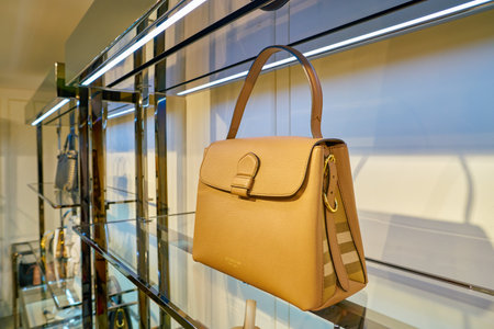 MILAN, ITALY - CIRCA NOVEMBER, 2017: close up shot of Burberry bag on display at Rinascente. Rinascente is a collection of high-end stores.のeditorial素材