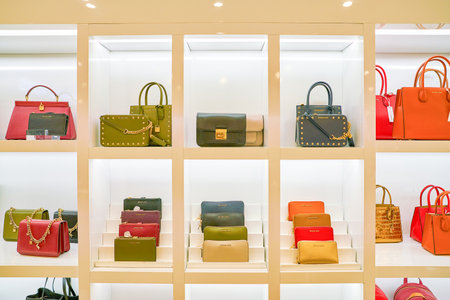 MILAN, ITALY - CIRCA NOVEMBER, 2017: Michael Kors bags on display at Rinascente. Rinascente is a...