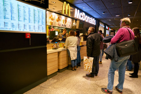 WARSAW, POLAND - CIRCA NOVEMBER, 2017: counter service in a McDonald's Restaurant at Warsaw Frederic...