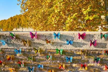ROME, ITALY - CIRCA NOVEMBER, 2017: colourful fake butterflies on a bridge in Rome.のeditorial素材