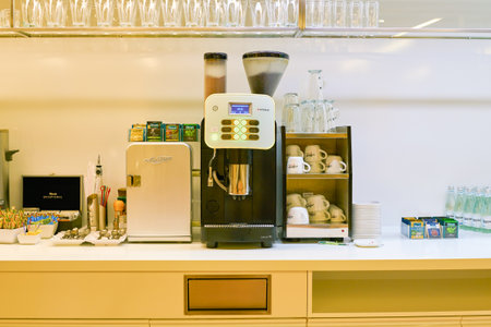 WARSAW, POLAND - CIRCA NOVEMBER, 2017: a coffee machine at Preludium Executive Lounge in Warsaw Chopin Airportのeditorial素材